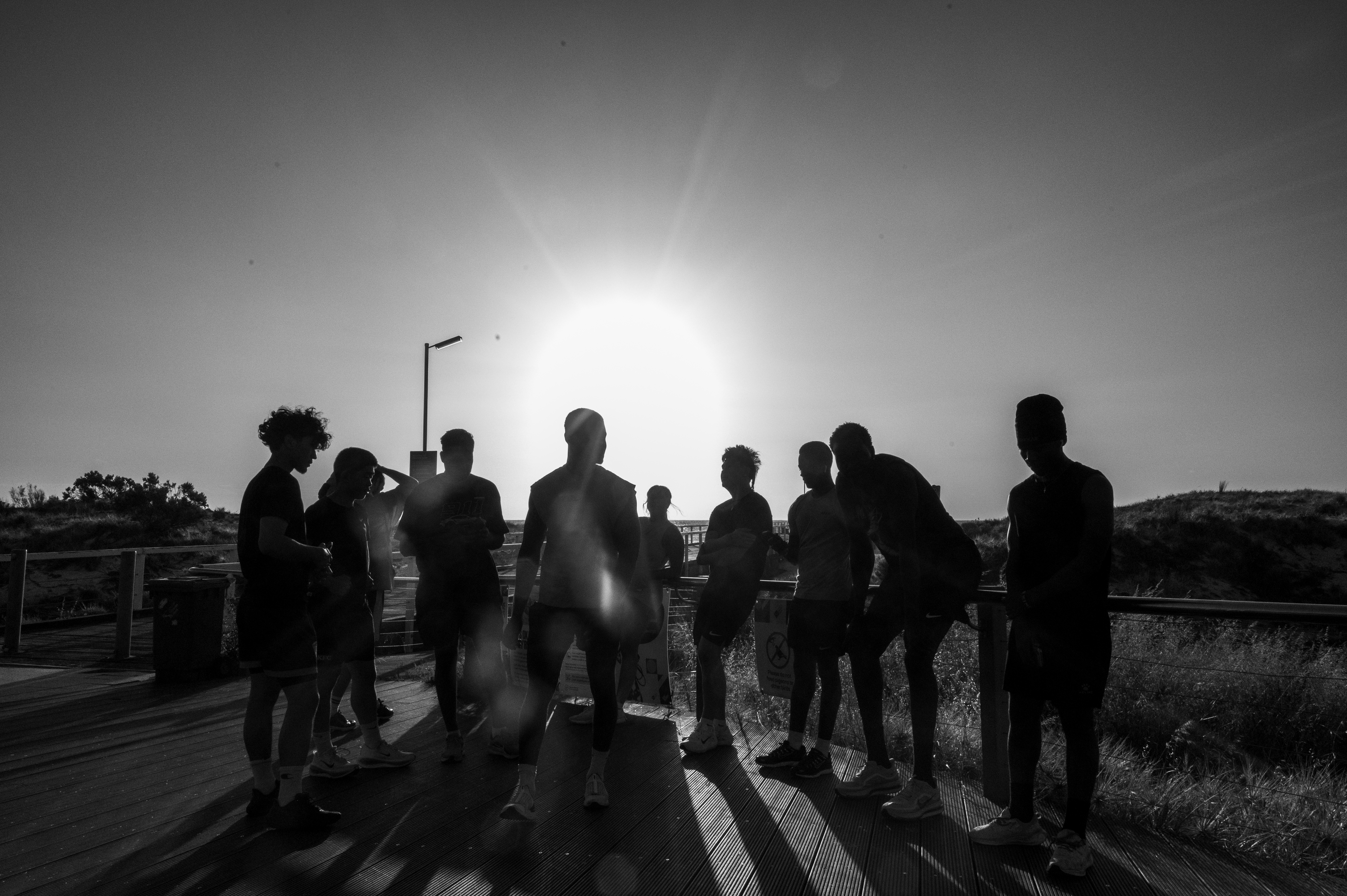 L4TC crew silhouetted at sunset